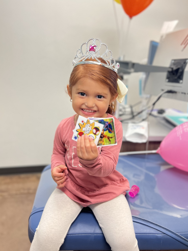 Caring for Dental Crowns Happy Scottsdale Patient with Prizes